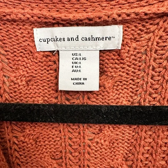 CUPCAKES AND CASHMERE | Cable-Knit Button Cardigan in Rust Orange - Picture 5 of 8